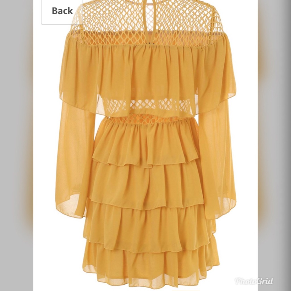 Elegant mustard woman’s ruffle dress